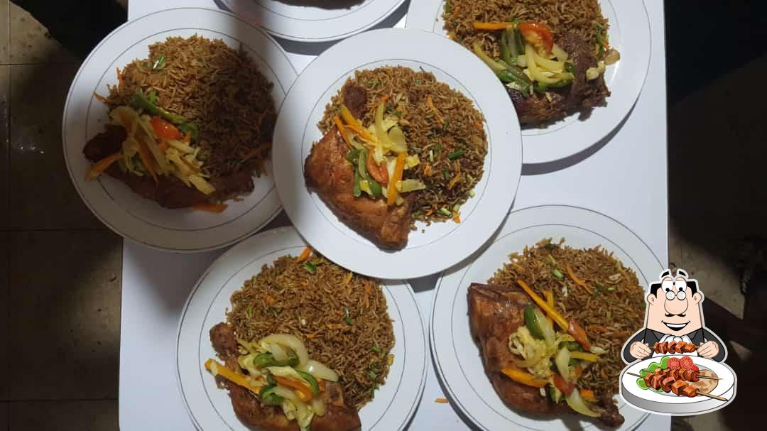 Chicken, seasoned rice and vegetables served at Crest Restaurant